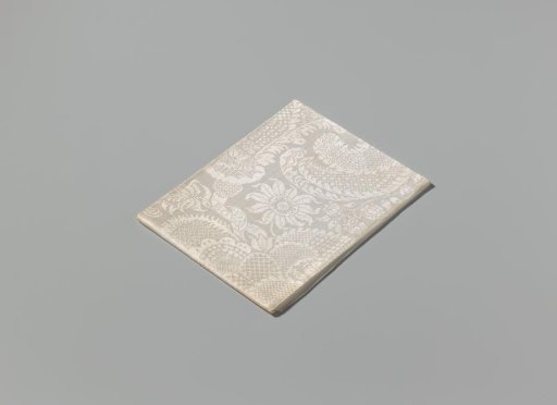 Linen damask napkin with a lace pattern