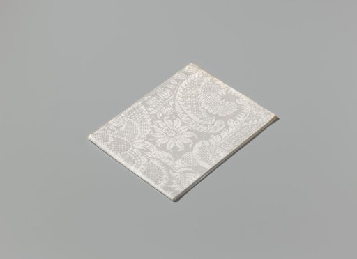 Linen damask napkin with a scroll pattern
