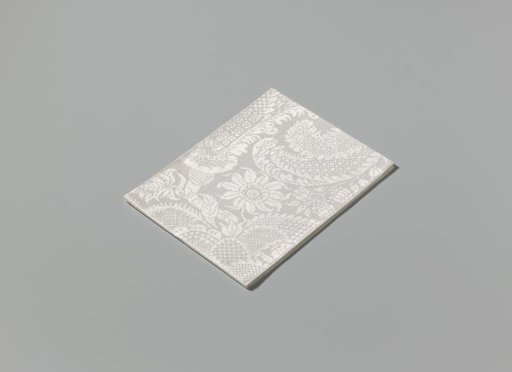 Linen damask napkin with a scroll pattern
