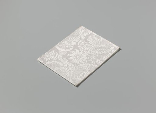 Linen damask napkin with a scroll pattern