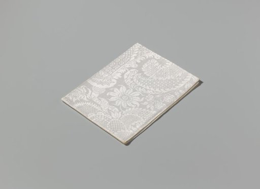 Linen damask napkin with a scroll pattern