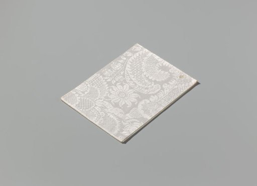 Linen damask napkin with a scroll pattern