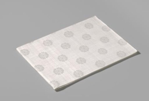 Linen damask napkin with a floral pattern
