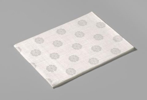 Linen damask napkin with a floral pattern