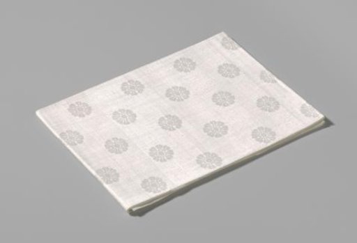 Linen damask napkin with a floral pattern