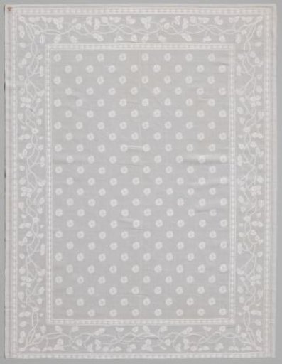Napkin with pattern of rosettes and rose branches