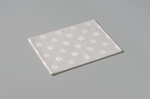 Napkin with pattern of rosettes and rose branches