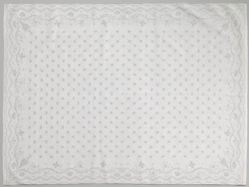 Napkin with scattered leaf and border with carnations