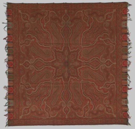 Square cashmere shawl with a small central star around which a multicoloured all-over pattern