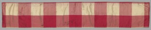 Embrasse of red-and-white checkered silk
