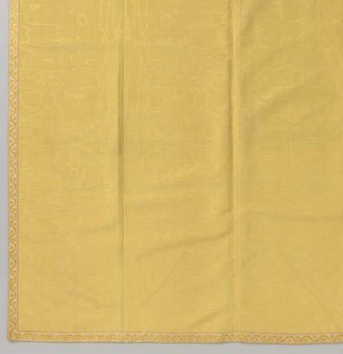 Curtain of a bed set made of watered yellow wool