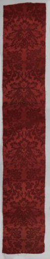 Fragment of red silk weave; damask.