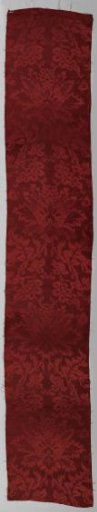 Fragment of red silk weave; damask.