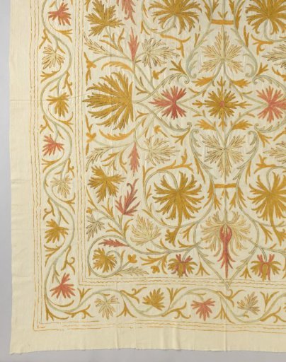 Coverlet of oriental textile with embroidery