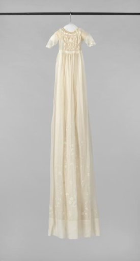 Baptismal Gown of Embroidered Batiste Decorated with Oval Flowers and Bunches of Fruit