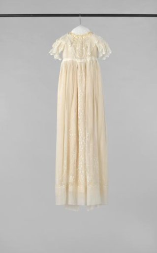 Christening gown of embroidered batiste, decorated with groups of tulips and sprigs of flowers