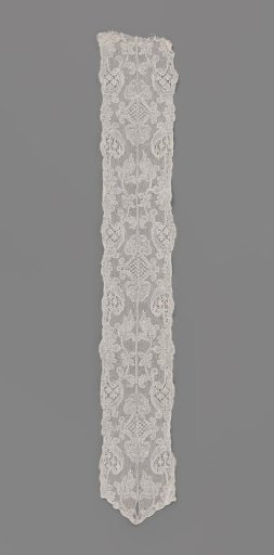 Barbe of two sewn-together mirrored strips of Mechelen lace