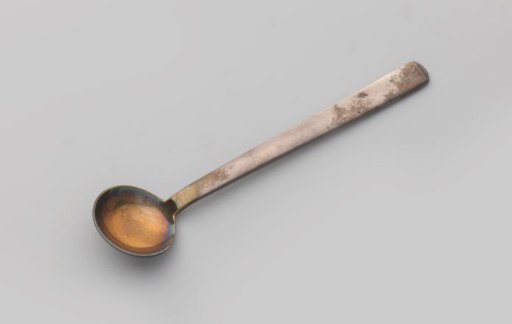 Spoon with a Round Bowl and a Handle Widening Towards the End