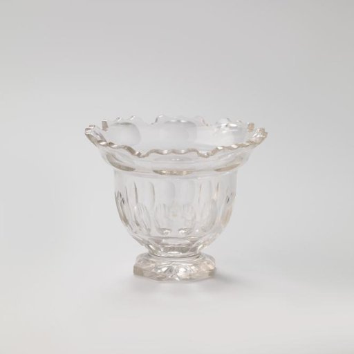 Sugar bowl of cut crystal on an octagonal foot