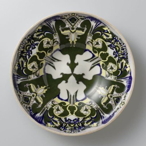 Earthenware dish decorated with a symmetrically stylized motif