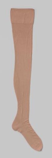 Stocking of flesh-colored silk with openwork arrows on the instep and openwork diamond shape against the edge