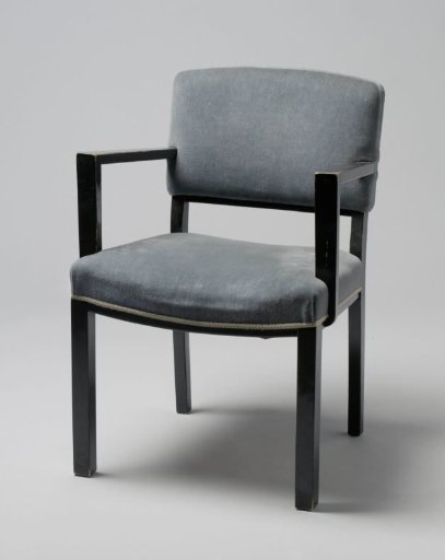 Armchair with angular arms and upholstered in blue tripe