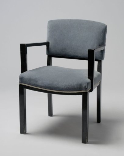 Armchair with angular armrests and upholstered in blue tripe