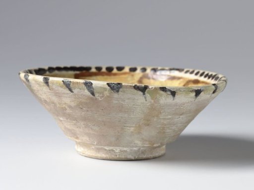 Bowl with ornamental borders and scrolls
