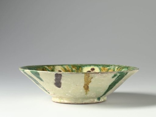 Bowl with incised flower and scrolls