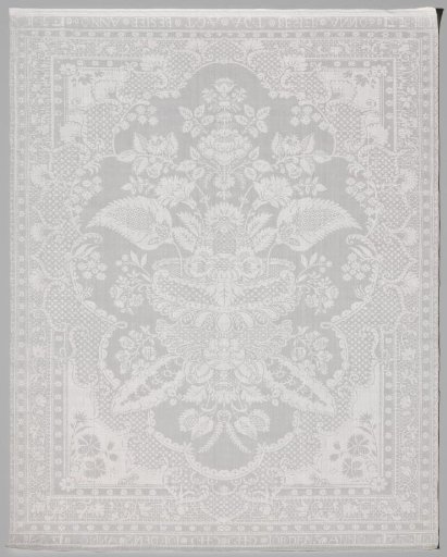 Napkin of linen damask with a lace pattern