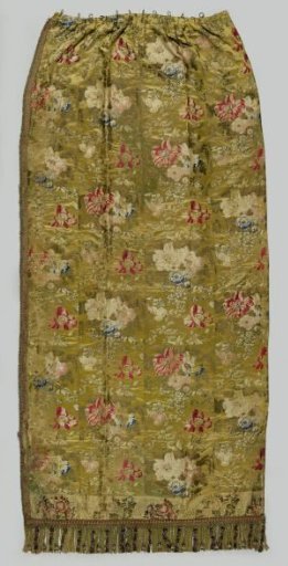Curtain with a floral design on a yellow ground