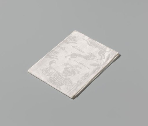 Napkin with falcon and deer hunting.