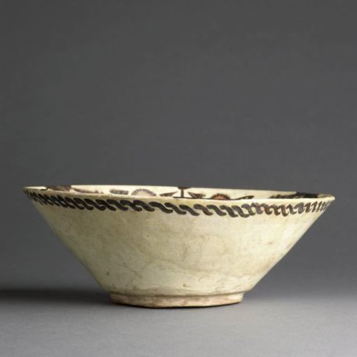 Bowl with stylized flower sprays and (pseudo)-inscription