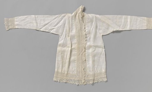 Kabaya of white linen batiste edged all around with a wide, scalloped strip of machine-made lace