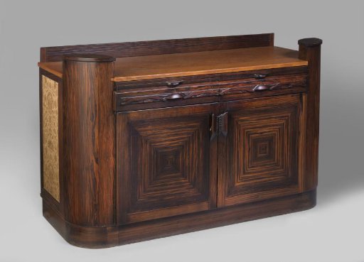 Buffet of oak and coromandel wood with carved stylized leopards