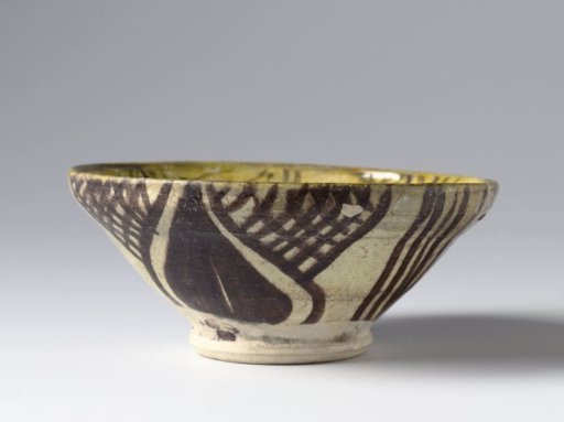 Bowl with scrolls and decorative lines