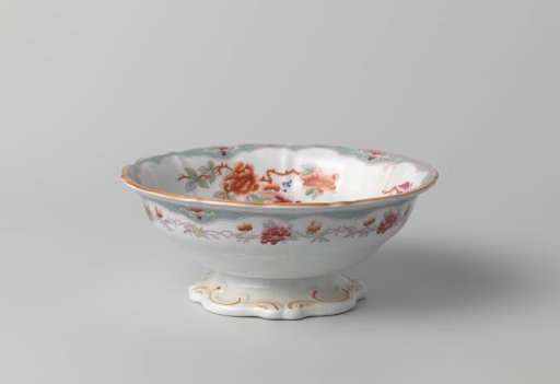 Bowl with polychrome decoration featuring a garden vase, a fence, and flowers
