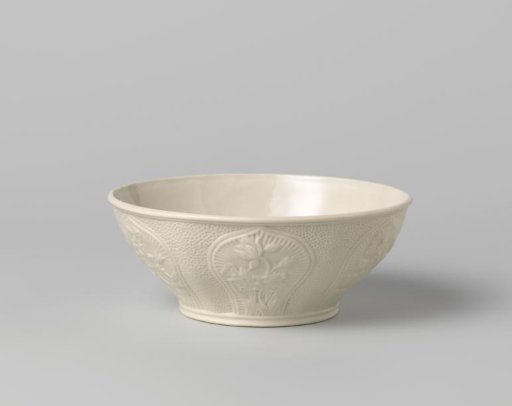 Spool bowl, hexagonal, stoneware, with cartouches featuring relief flowers