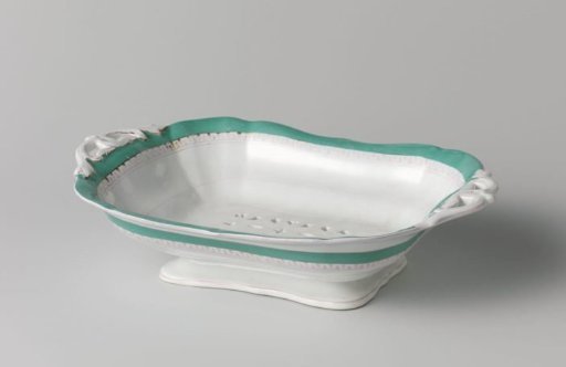 Platter on a foot, with a green border and a golden Greek band