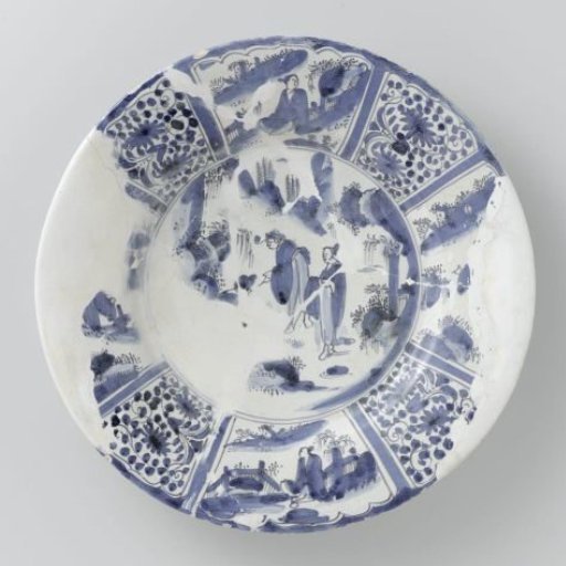 Fragmentary dish, the flat painted in blue with chinoiserie. Rim with Wan Li decoration
