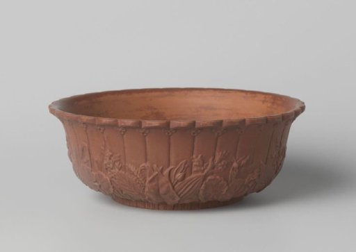 Bowl, shaped, with flowers and leaves in relief