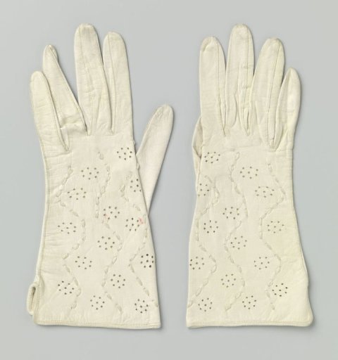 Glove of glazed leather with opening at the side seam, perforations on the hand with a decorative cord threaded through the perforations