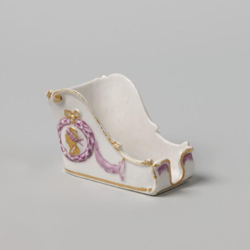 Pipe sled, with painted male head within laurel wreath in relief