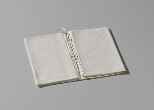 Towel or napkin of white linen damask