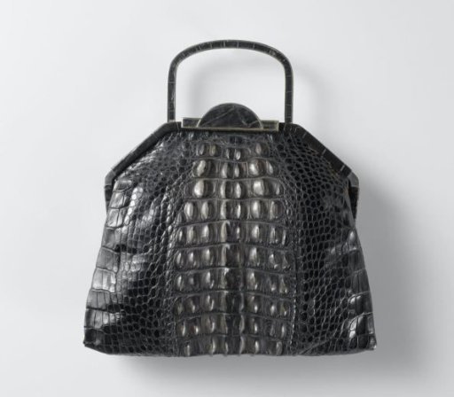 Handbag of black crocodile leather with silver-coloured metal frame, clasp and handle
