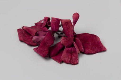 Corsage consisting of two orchids of violet velvet with stem