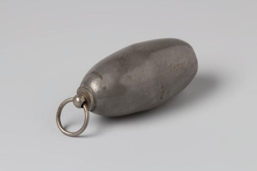 Mofkruik or lead weight, oval-shaped with a ring on one side