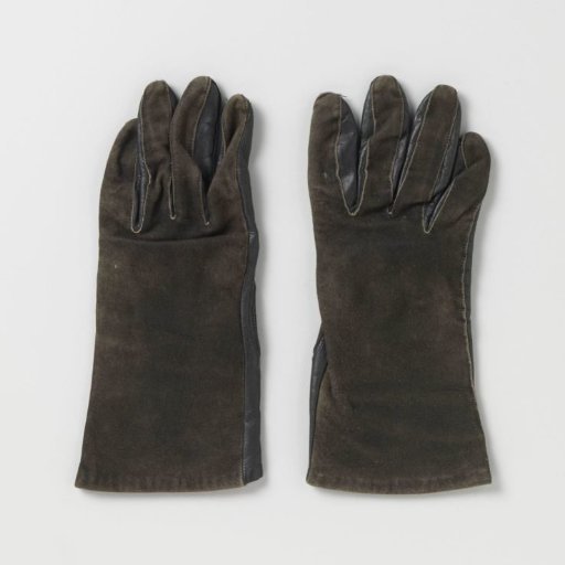 Glove of brown suede and black leather
