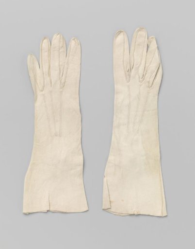 White deerskin glove with plastic mother-of-pearl button