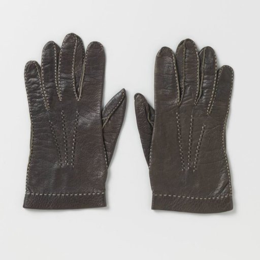 Black leather glove with white embroidery